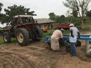 Tractor supporting field operations