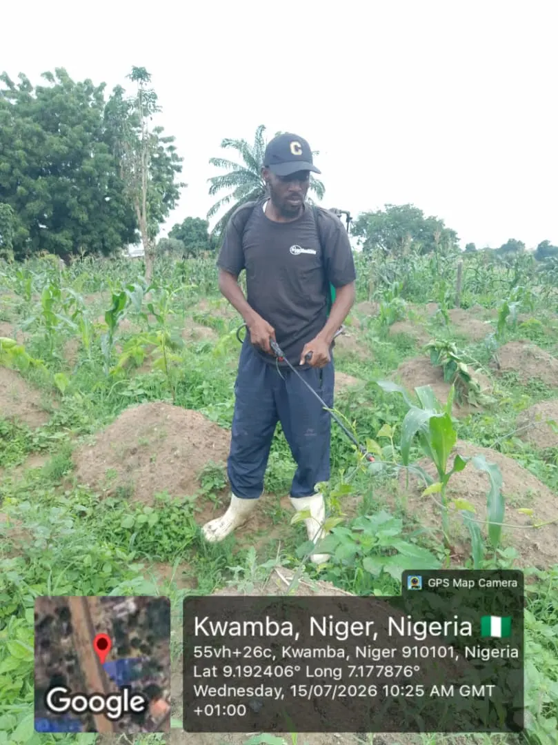 Field representative inspecting crop conditions during a TechAgroBridge visit